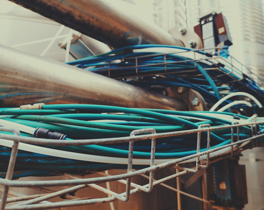 Fiber optic licensure certification — technician splicing fiber cables